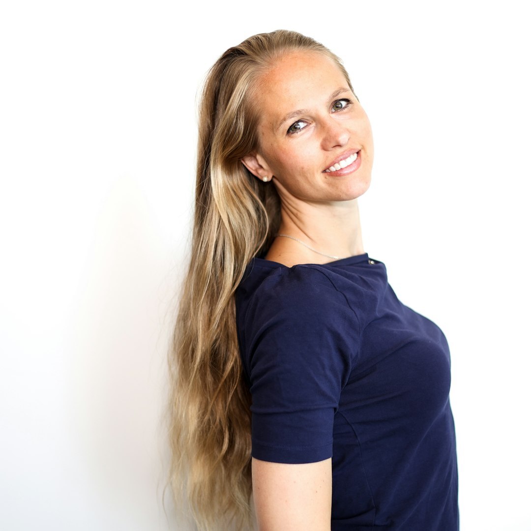 Professional Norwegian woman journalism instructor with confident expression